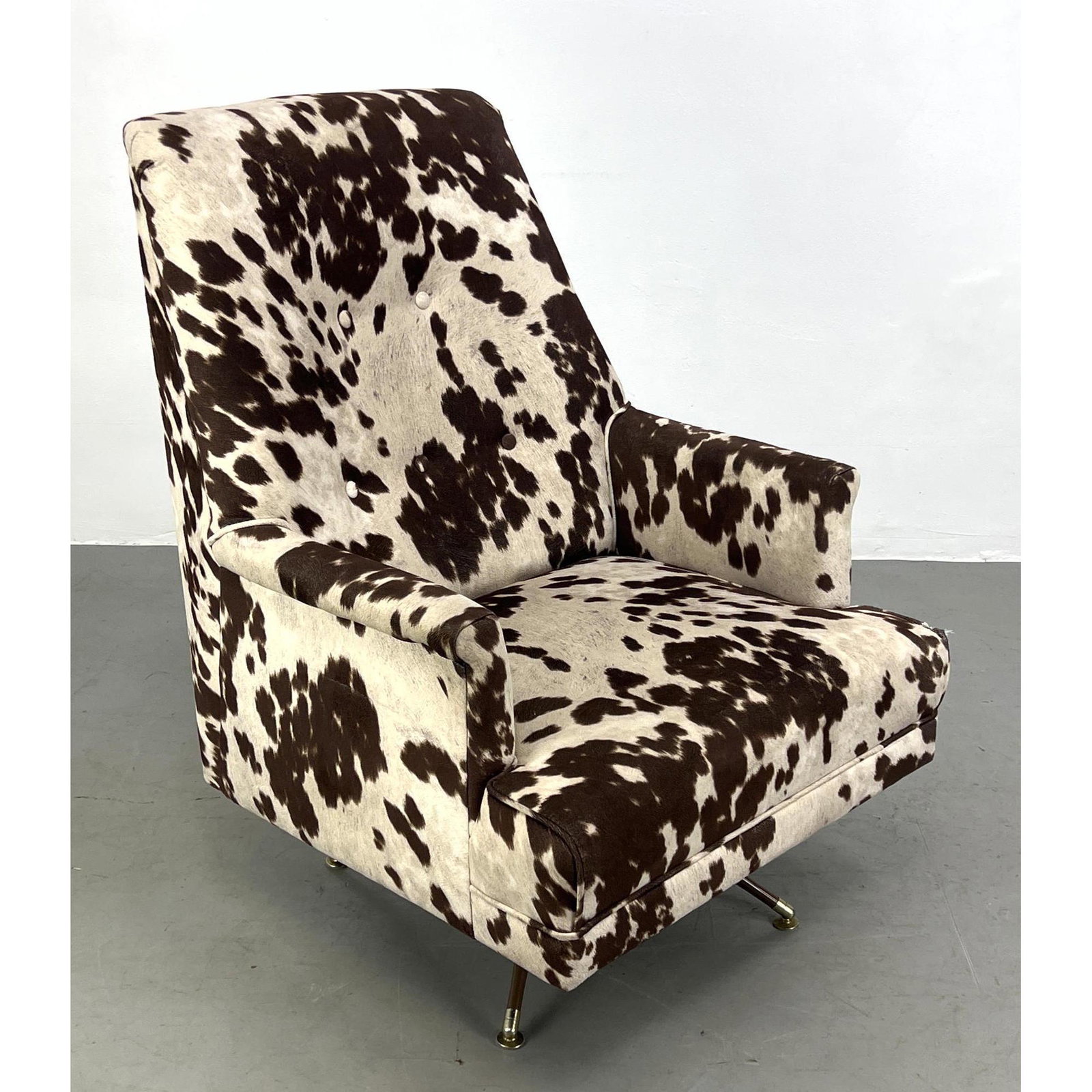 Modernist Swivel Lounge Chair. Printed Animal Hide Pattern Upholstery.: Modernist Swivel Lounge Chair. Printed Animal Hide Pattern Upholstery. Dimensions: H: 38 inches: W: 26 inches: D: 32 inches ---