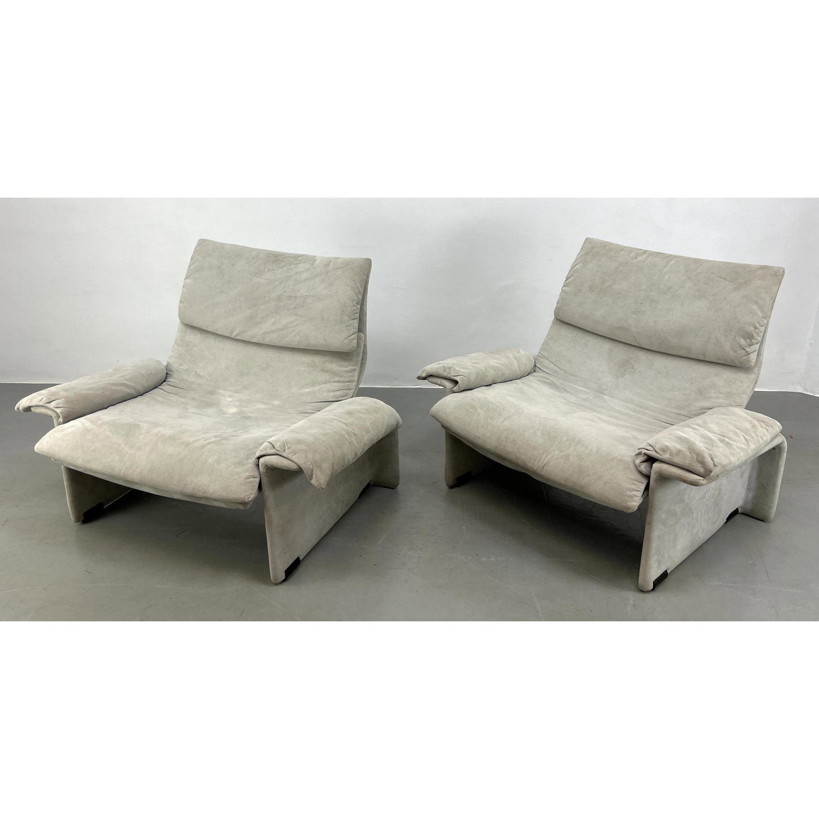 Pr SAPORITI ITALIA Gray Suede Lounge Chairs. Wide Arms with Pillow armrests. Label.: Pr SAPORITI ITALIA Gray Suede Lounge Chairs. Wide Arms with Pillow armrests. Label. Dimensions: H: 33.5 inches: W: 45 inches: D: 32 inches - Seat Height: 17 inches ---