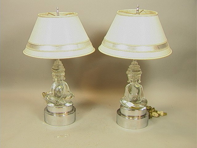 Pair 70's Modern Crystal and Chrome Buddha Lamps.: Pair 70's Modern Crystal and Chrome Buddha Lamps. Seated figure. -- Dimensions: H: 22 inches: W: 13 inches --- Condition (General): Very Good Condition. Please contact us with specific questions about