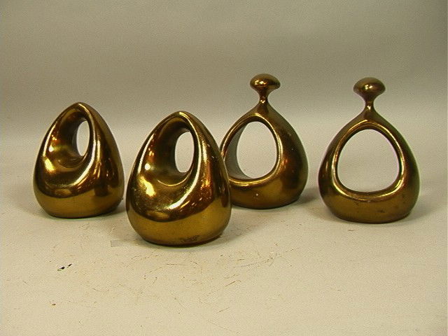 2 pair Ben Seibel Bookends. Jenfred-ware. Brass: 2 pair Ben Seibel Bookends. Jenfred-ware. Brass coated. Unmarked.-- Dimensions: H: 6.75 inches: W: 5 inches: D: 4 inches --- Condition (General): some wear. Two missing felt pads. Please contact us wi