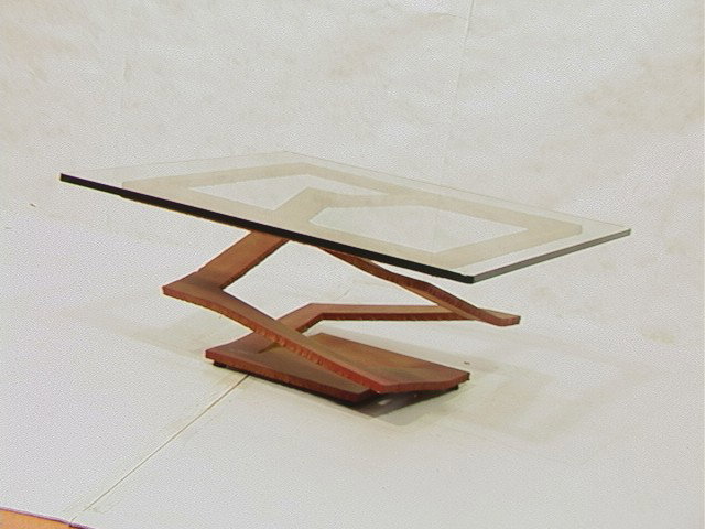 Heavy Industrial Steel Coffee Table. Torch Cut La: Heavy Industrial Steel Coffee Table. Torch Cut Layered Steel Spring style Base. Square 3/4" Glass Top. Studio Made. Unmarked.-- Dimensions: H: 7.5 inches: W: 42 inches: D: 42 inches --- Condition (Gen