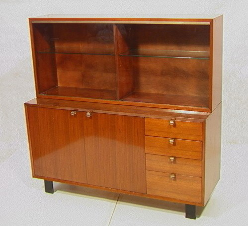 GEORGE NELSON for HERMAN MILLER Cabinet. Glass Sl: GEORGE NELSON for HERMAN MILLER Cabinet. Glass Sliding Door Top on Two Door, Four Drawer Credenza Base. -- Dimensions: H: 54 inches: D: 18.5 inches: L: 56.5 inches --- Condition (General): Very Good C