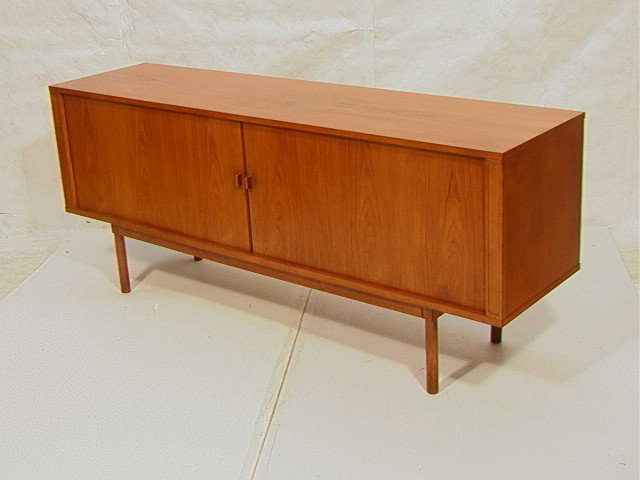 LOVIG Dansk Danish Teak Credenza Cabinet Sideboar: LOVIG Dansk Danish Teak Credenza Cabinet Sideboard. Tambour Doors and fitted interior. Branded. -- Dimensions: H: 31.75 inches: D: 20 inches: L: 79 inches --- Condition (General): Very Good Condition.