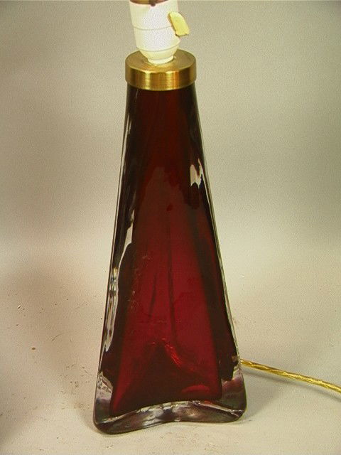 ORREFORS Cased Glass Red & Clear Lamp. Triangular: ORREFORS Cased Glass Red & Clear Lamp. Triangular tapered base. Marked ORREFORS on Metal. Glass is 14" Tall.-- Dimensions: --- Condition (General): Very Good Condition. No Shade. Please contact us wit