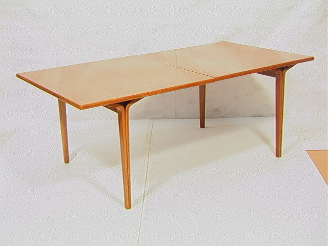 KNOLL Dining Table. Large Rectangular Top. Design: KNOLL Dining Table. Large Rectangular Top. Designed by ROBERT DeFUCCIO. Made by KNOLL INTERNATIONAL. Model #3957 Extension Table. Curved Molded Laminate Legs. With (1) 15.5" leaf. Marked: Knoll. -- Di