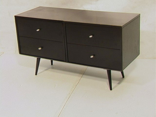 PAUL McCOBB pair two drawer cabinets on platform: PAUL McCOBB pair two drawer cabinets on platform base. Metal pulls. PLANNER GROUP. Unmarked.-- Dimensions: H: 26.75 inches: W: 48 inches: D: 18.25 inches --- Condition (General): Wear to black finish