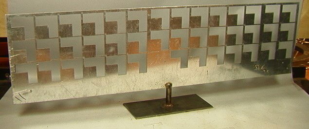 MATHIAS GOERITZ, Mexican Sculpture. Cut Out Grid: MATHIAS GOERITZ, Mexican Sculpture. Cut Out Grid Design Panel Mounted on Steel Base. Initials.-- Dimensions: H: 16 inches: L: 48 inches --- Please contact us with specific questions about condition, n