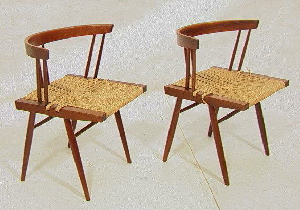 Pr GEORGE NAKASHIMA Chairs. American Studio Walnu: Pr GEORGE NAKASHIMA Chairs. American Studio Walnut Chairs with Woven Grass Seats. 2 PCS. -- Dimensions: H: 27 inches: W: 23 inches: D: 18 inches --- Condition (General): Very Good Condition. Cord brok
