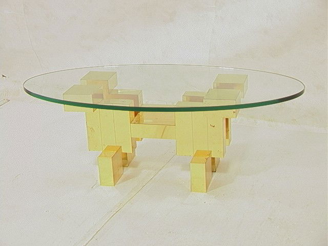 PAUL EVANS style Brass Block Cocktail Table. 3/4": PAUL EVANS style Brass Block Cocktail Table. 3/4" Glass Top. Architectural base coffee table.-- Dimensions: H: 16 inches: W: 48 inches: D: 24 inches --- Condition (General): Missing one brass block. S
