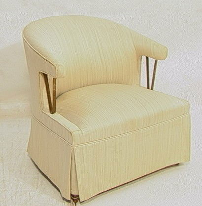 Upholstered Side Arm Lounge Chair. Flat Brass Rod: Upholstered Side Arm Lounge Chair. Flat Brass Rod Arm Support. Skirted Chair.-- Dimensions: H: 27.5 inches: W: 30 inches: D: 32 inches --- Condition (General): Hole to fabric on front edge corner. Ove
