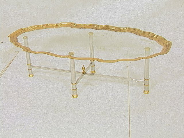 Decorator Brass and Chrome Coffee Cocktail Table.: Decorator Brass and Chrome Coffee Cocktail Table. Brass framed glass tray top on brass and chrome base.-- Dimensions: H: 16.5 inches: W: 56 inches: D: 28.25 inches --- Condition (General): Metal needs