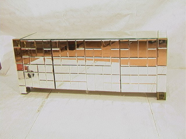 Decorator Patchwork Mirrored Credenza. Beveled Mi: Decorator Patchwork Mirrored Credenza. Beveled Mirror panels.-- Dimensions: H: 29 inches: D: 20.5 inches: L: 73.5 inches --- Condition (General): Missing interior shelves. Missing one mirror panel on 