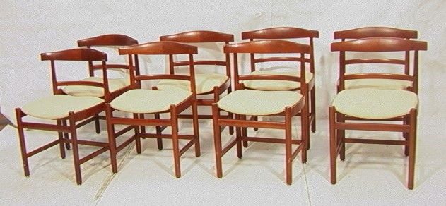 Set 8 Danish Modern Teak Dining Chairs. Curved Up: Set 8 Danish Modern Teak Dining Chairs. Curved Upholstered Cushion Seats. Unmarked. 8 PCS.-- Dimensions: H: 31 inches: W: 23 inches: D: 20 inches --- Condition (General): Some repairs to side rails su