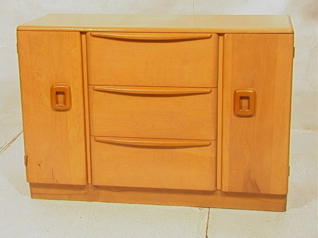 HEYWOOD WAKEFIELD Sideboard Credenza. Champagne 2: HEYWOOD WAKEFIELD Sideboard Credenza. Champagne 2 Door 3 Drawer. Wood Pulls. Marked Champagne. M592. -- Dimensions: H: 33 inches: W: 48 inches: D: 19.5 inches --- Condition (General): Very Good Condit