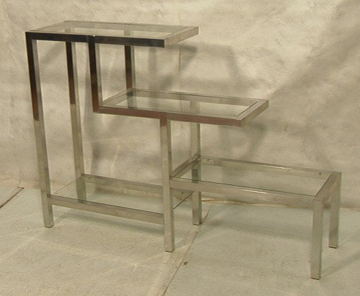 70Õs Modern Aluminum and Glass Stepped Etagere.: 70Õs Modern Aluminum and Glass Stepped Etagere. Square tube frame with inset glass. -- Dimensions: H: 42 inches: W: 61 inches: D: 15 inches --- Condition (General): Very Good Condition. Please contac