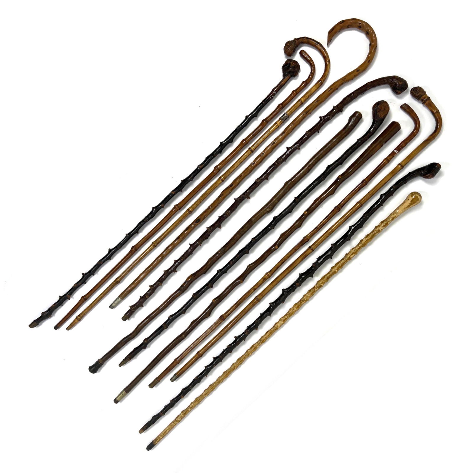 12pcs Vintage Canes and Walking Sticks. Burl, stick. Thorn stick, Bent wood: 12pcs Vintage Canes and Walking Sticks. Burl, stick. Thorn stick, Bent wood Dimensions: H: 36.5 inches ---