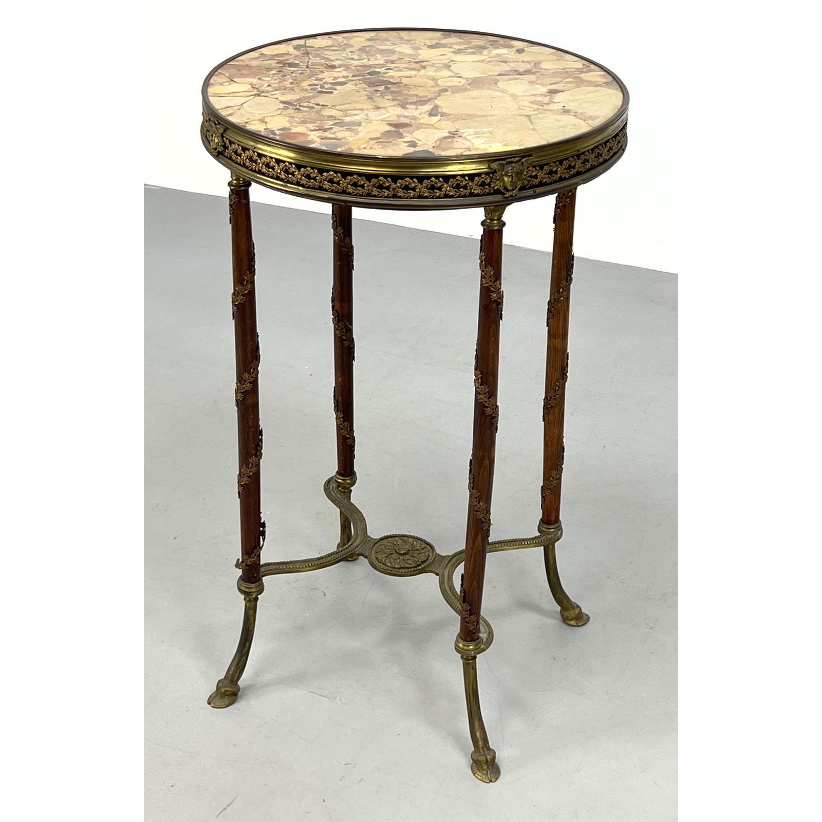 Antique French Marble Top Gueridon Table. Gilt metal trim and leg elements. Skirt with wreath and He (1 of 10)