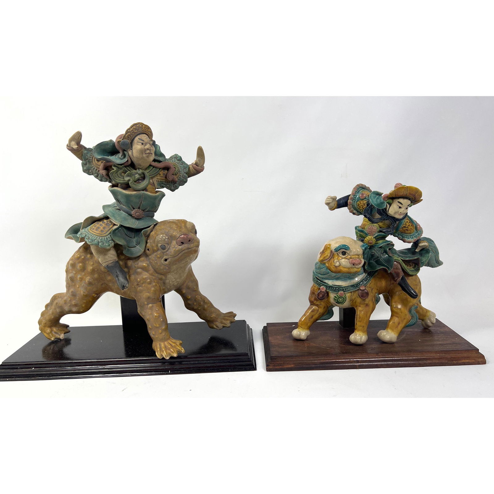 Polychrome Glazed Pottery Asian Sculptures. Human figures ride mythical animals. Custom stands. (1 of 8)