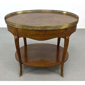 Vintage BAKER Oval Mahogany Side Table. Brass Gallery Trim. Ormolu foot details. Metal Baker tag First Image