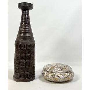 2pc Mid Century Pottery. JAY SPECTRE Lidded Box . Bitossi Tall Bottle Form Vase: 2pc Mid Century Bitossi Pottery. JAY SPECTRE Lidded Box with Gold Linear Circle Details. Tall Bitossi Bottle Form Vase marked ITALY. Dimensions: H: 15.75 inches: W: 4 inches: D: 4 inches ---