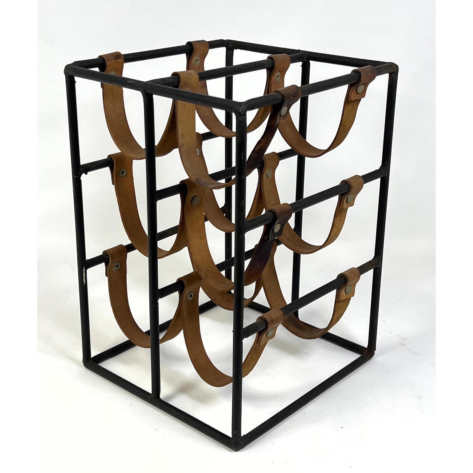 ARTHUR UMANOFF Black Iron and Leather Wine Rack.: ARTHUR UMANOFF Black Iron and Leather Wine Rack. Dimensions: H: 14 inches: W: 9.5 inches: D: 10 inches ---