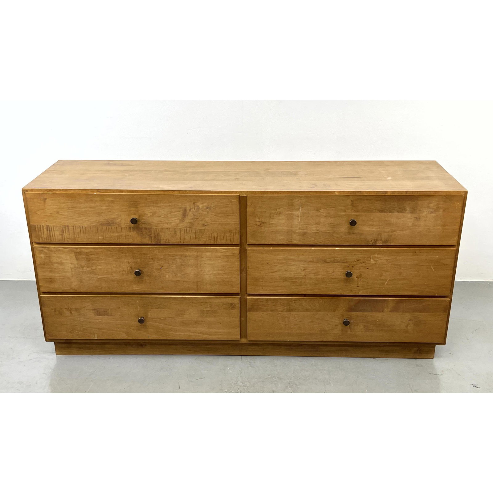 Modernist Credenza Low Double Dresser. Chest of Drawers. Metal pulls. Recessed platform base. McCobb: Modernist Credenza Low Double Dresser. Chest of Drawers. Metal pulls. Recessed platform base. McCobb Style. Dimensions: H: 27 inches: W: 60 inches: D: 16 inches ---