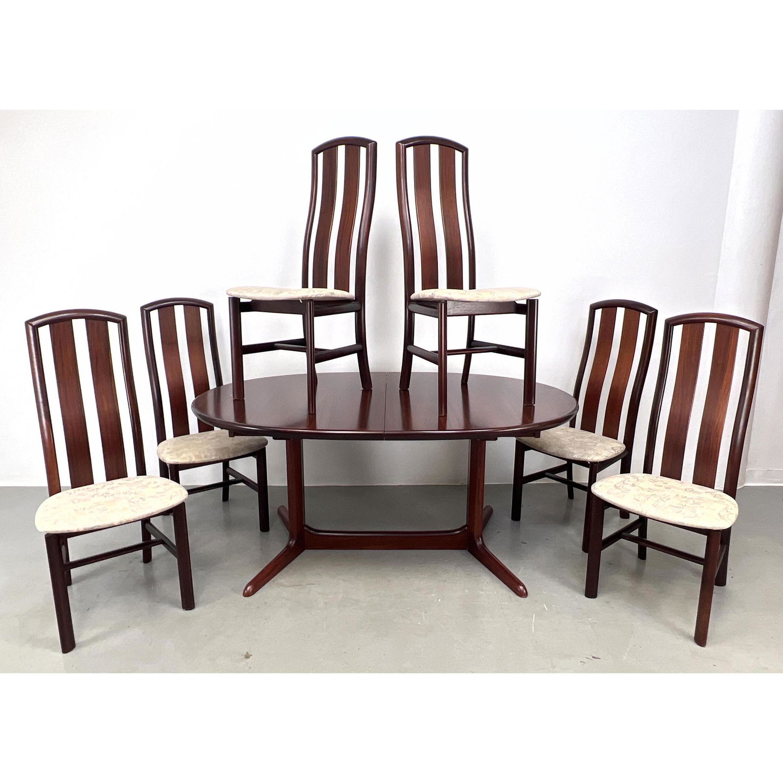 7pc Rosewood SKOVBY Danish Modern Dining Set. Dining Table, Six Side Chairs. Two 19.75" hidden leave: 7pc Rosewood SKOVBY Danish Modern Dining Set. Dining Table, Six Side Chairs. Two 19.75" hidden leaves. Dimensions: H: 29 inches: W: 65 inches: D: 40.5 inches ---