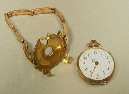 FULTON W.M. Swiss "Duo" Pocket watch and Wrist Wa: FULTON W.M. Swiss "Duo" Pocket watch and Wrist Watch. Ladies Gold Fill Pocket watch can be converted to wristwatch by securing it to a G/F band with holder for watch. Adjustable flexible band. Marked.