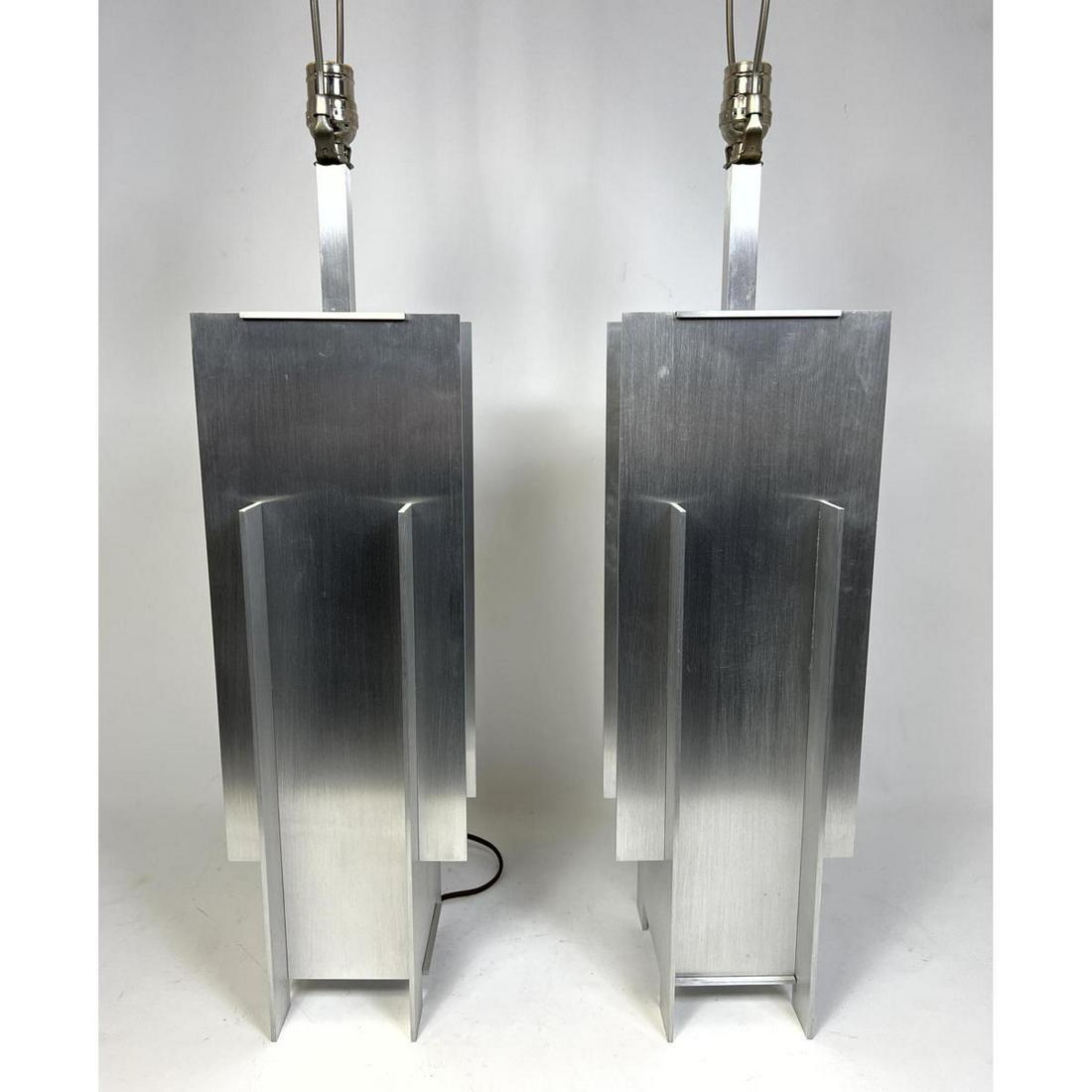 Pair of Machined Aluminum Machine Age Style Lamps. Robert Sonneman style.: Pair of Machined Aluminum Machine Age Style Lamps. Robert Sonneman style. Dimensions: H: 36 inches: W: 7 inches: D: 7 inches ---