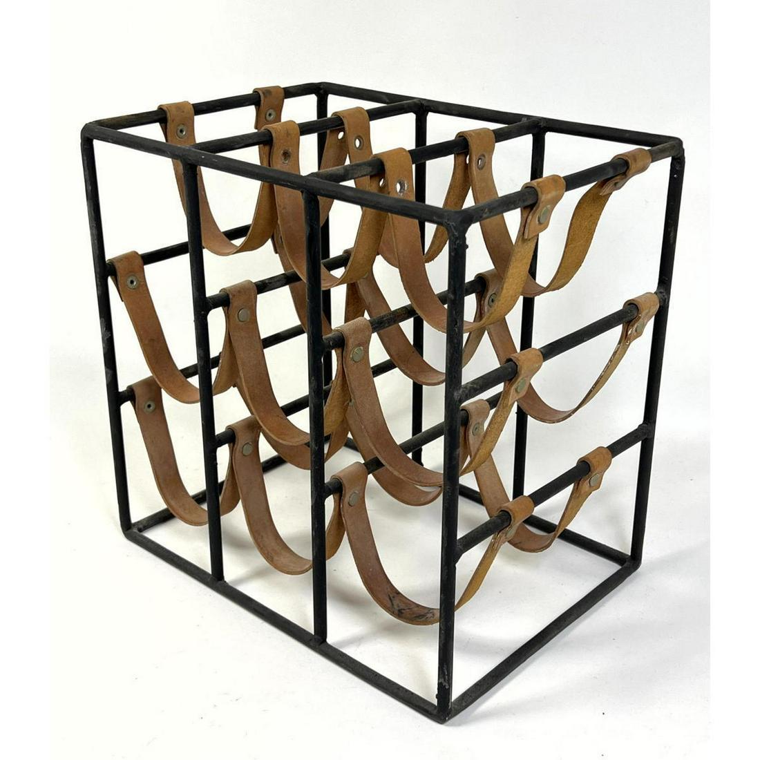 ARTHUR UMANOFF Black Iron and Leather Wine Rack. Leather straps. Bar Modernist.: ARTHUR UMANOFF Black Iron and Leather Wine Rack. Leather straps. Bar Modernist. Dimensions: H: 14 inches: W: 14 inches: D: 10 inches ---