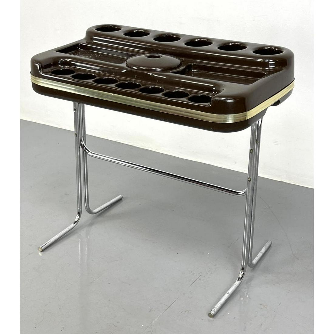 VITTORIO PARIGI Italian Floating Oryk Bar. 1970's. Brown molded plastic fitted bar on chrome tube l: VITTORIO PARIGI Italian Floating Oryk Bar. 1970's. Brown molded plastic fitted bar on chrome tube legs. Ice bucket lid is present. Dimensions: H: 29.5 inches: W: 33 inches ---