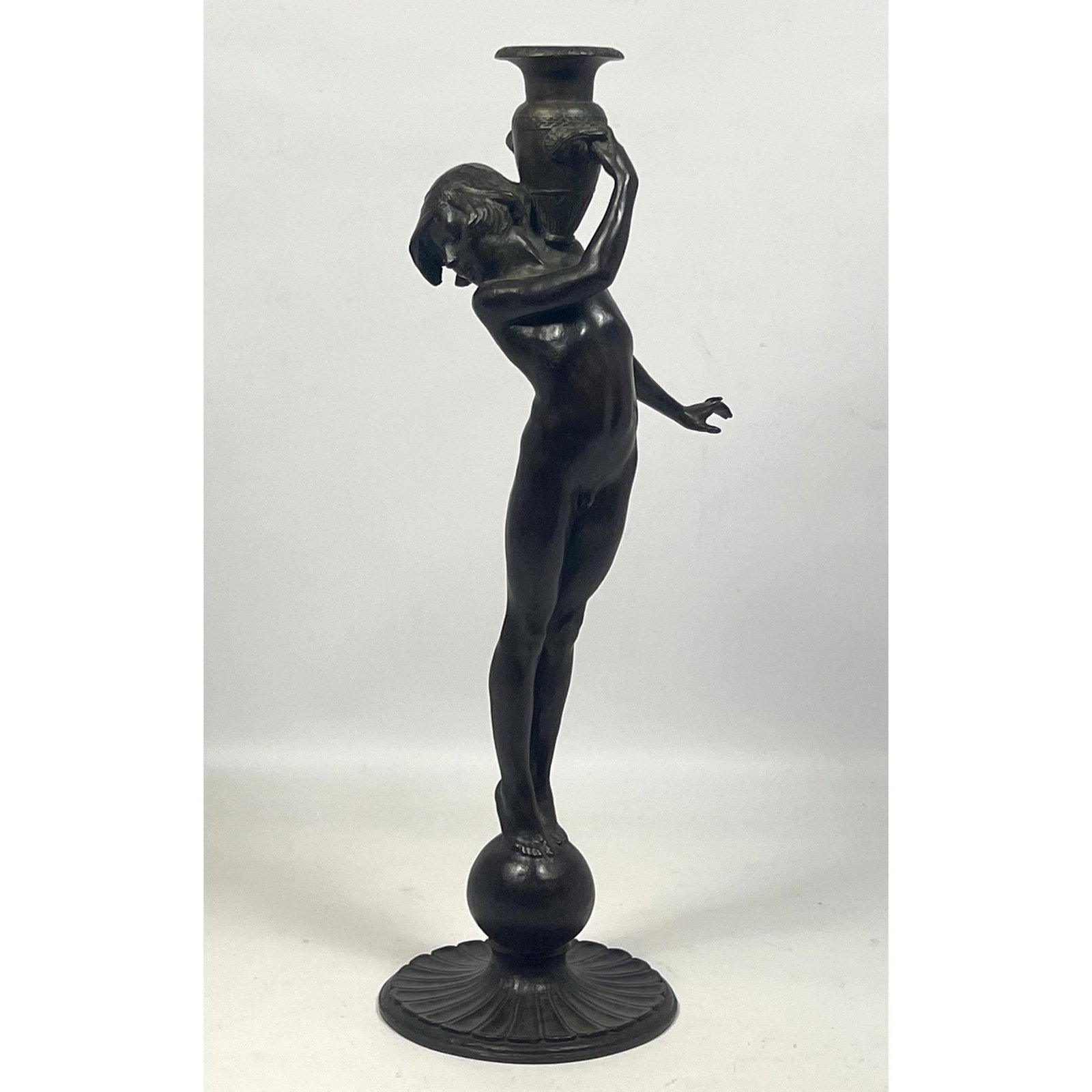 Edward Francis McCartan, Waterbearer candleholder Candlestick. Youthful figure in playful pose above (1 of 10)