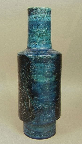 18" Tall RAYMOR Pottery Vase Italy. Shades of blue w: 18" Tall RAYMOR Pottery Vase Italy. Shades of blue with carved design. Labeled.-- Dimensions: H: 18 inches: W: 5.5 inches --- Condition (General): Very Good Condition. Please contact us with specific