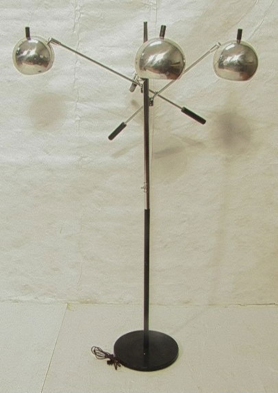 Modernist Three Ball Chrome Floor Lamp with Adjus: Modernist Three Ball Chrome Floor Lamp with Adjustable Arms. Chrome and black stem. Classic Form like Arteluce. -- Dimensions: H: 69 inches: W: 35 inches --- Condition (General): Very Good Condition.