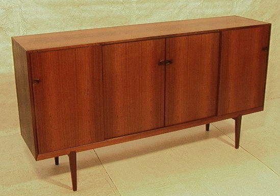 Rosengren Hansen Rosewood Sideboard Credenza with: Rosengren Hansen Rosewood Sideboard Credenza with Four Sliding Doors. Adjustable shelves and drawers. Purchased early sixties in Denmark.-- Dimensions: H: 41.25 inches: W: 78.5 inches: D: 18.75 inches