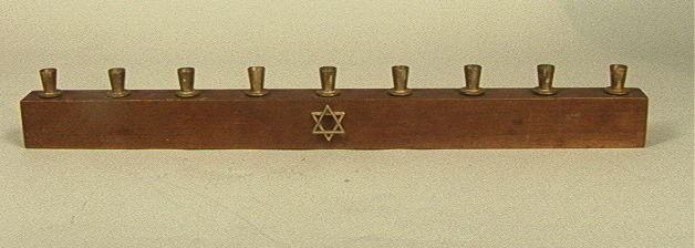 Phil Powell Walnut and Brass Menorah. Shows wear.: Phil Powell Walnut and Brass Menorah. Shows wear.-- Dimensions: H: 2.5 inches: W: 20 inches: D: 1.25 inches --- Please contact us with specific questions about condition, not visible in the photos. --