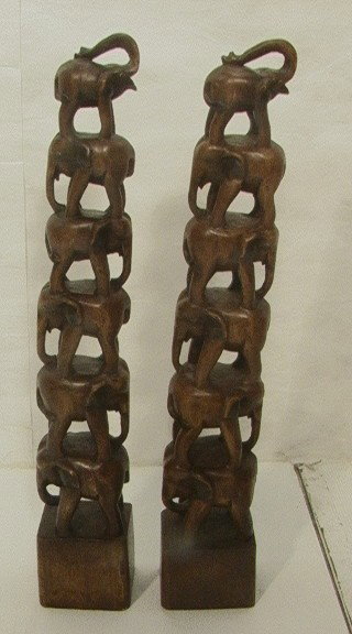 Pr Carved Wood Elephant Totem Sculptures. Six gra: Pr Carved Wood Elephant Totem Sculptures. Six graduated Size carved ELEPHANTS. 2 PCS. -- Dimensions: H: 31.5 inches: W: 5.5 inches: D: 4 inches --- Please contact us with specific questions about cond