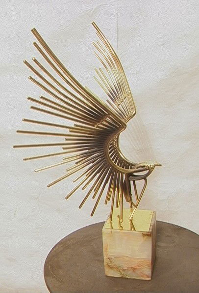 C Jere 77 Table Sculpture Brass Bird in Flight.: C Jere 77 Table Sculpture Brass Bird in Flight. Onyx Base. Signed.-- Dimensions: H: 26.5 inches: W: 18 inches: D: 13 inches --- Condition (General): Very Good Condition. Please contact us with specifi