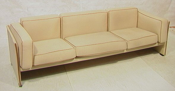 Cassina Modernist Sofa Couch. Tweed with leather: Cassina Modernist Sofa Couch. Tweed with leather trim. Labeled.-- Dimensions: H: 27 inches: W: 92 inches: D: 32 inches --- Condition (General): Some stains to upholstery. Please contact us with specif