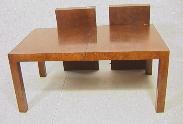 Milo Baughman Style Burled Wood Dining Table. Tw: Milo Baughman Style Burled Wood Dining Table. Two 22 Inch Leaves. Unmarked.-- Dimensions: H: 28.5 inches: W: 66 inches: D: 39 inches --- Condition (General): Edge chipping and some finish loss. Please