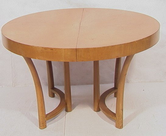 ROBSJOHN GIBBINGS Round Dining Table. Flared Tape: ROBSJOHN GIBBINGS Round Dining Table. Flared Tapered Legs. -- Dimensions: H: 29 inches: W: 48 inches: D: 48 inches --- Condition (General): Surface Blemishes. Scratches. Wear to legs. No leaves. Pleas