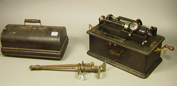 Thomas Edison Cylinder Phonograph. Dark Oak Cabi: Thomas Edison Cylinder Phonograph. Dark Oak Cabinet.-- Dimensions: --- Condition (General): Worn with losses.Cabinet 12.5 x16 x9 Please contact us with specific questions about condition, not visible 
