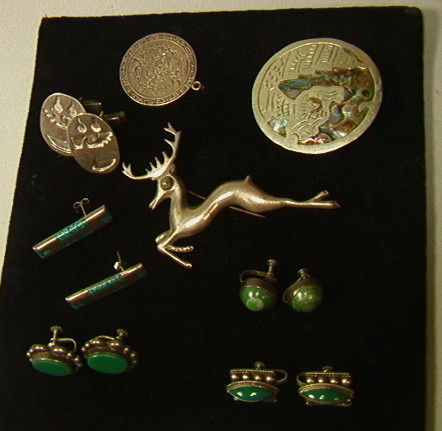 8pcs Mexican Sterling and Silver Jewelry. Deer p: 8pcs Mexican Sterling and Silver Jewelry. Deer pin, Abalone pin, Taxco Cufflinks, Pendent, 4 pairs earrings. 3.3oz-- Dimensions: --- Weight: 3.3 Troy ozs. ---- --- Please contact us with specific ques