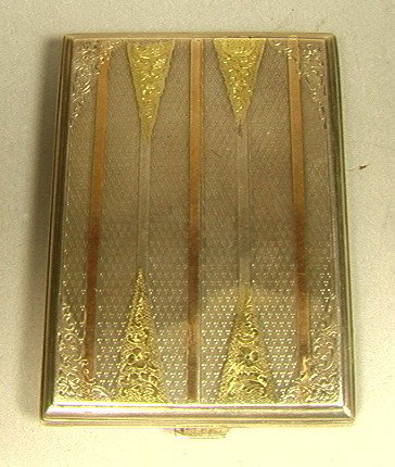 Heavy Sterling Cigarette Box with Gold Wash. Hal: Heavy Sterling Cigarette Box with Gold Wash. Hallmarked. Engraved design. 4.47oz-- Dimensions: H: 4 inches: W: 3 inches--- Weight: 4.47 Troy ozs. ---- --- Condition (General): Very Good Condition. Ple