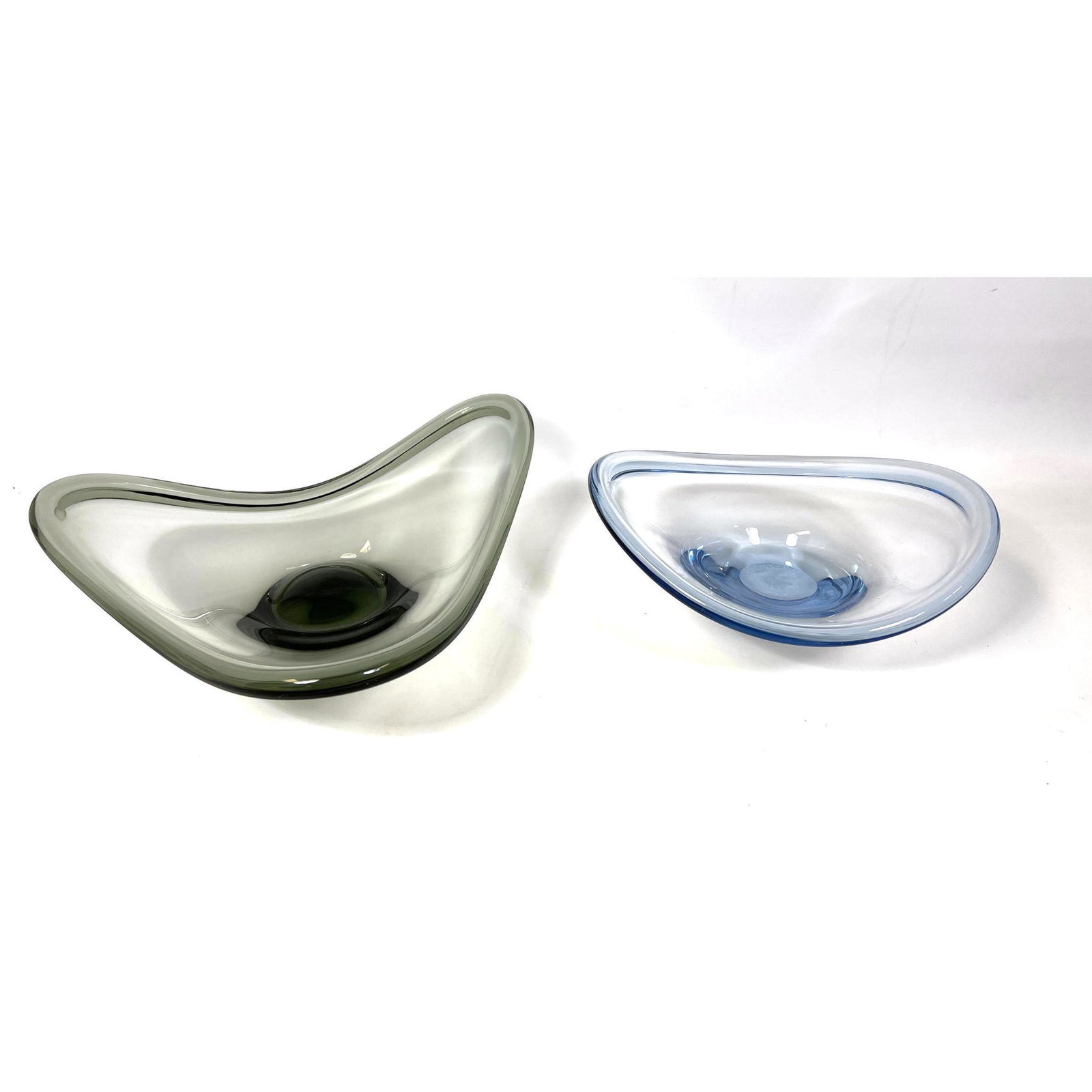 2pc HOLMEGAARD Art Glass. Sweden. Pale Blue; Smoked Glass. Each signed.: 2pc HOLMEGAARD Art Glass. Sweden. Pale Blue; Smoked Glass. Each signed. Dimensions: H: 5.25 inches: W: 14.5 inches: D: 15 inches --- US Shipping charge: In house shipping available. Will be calculated