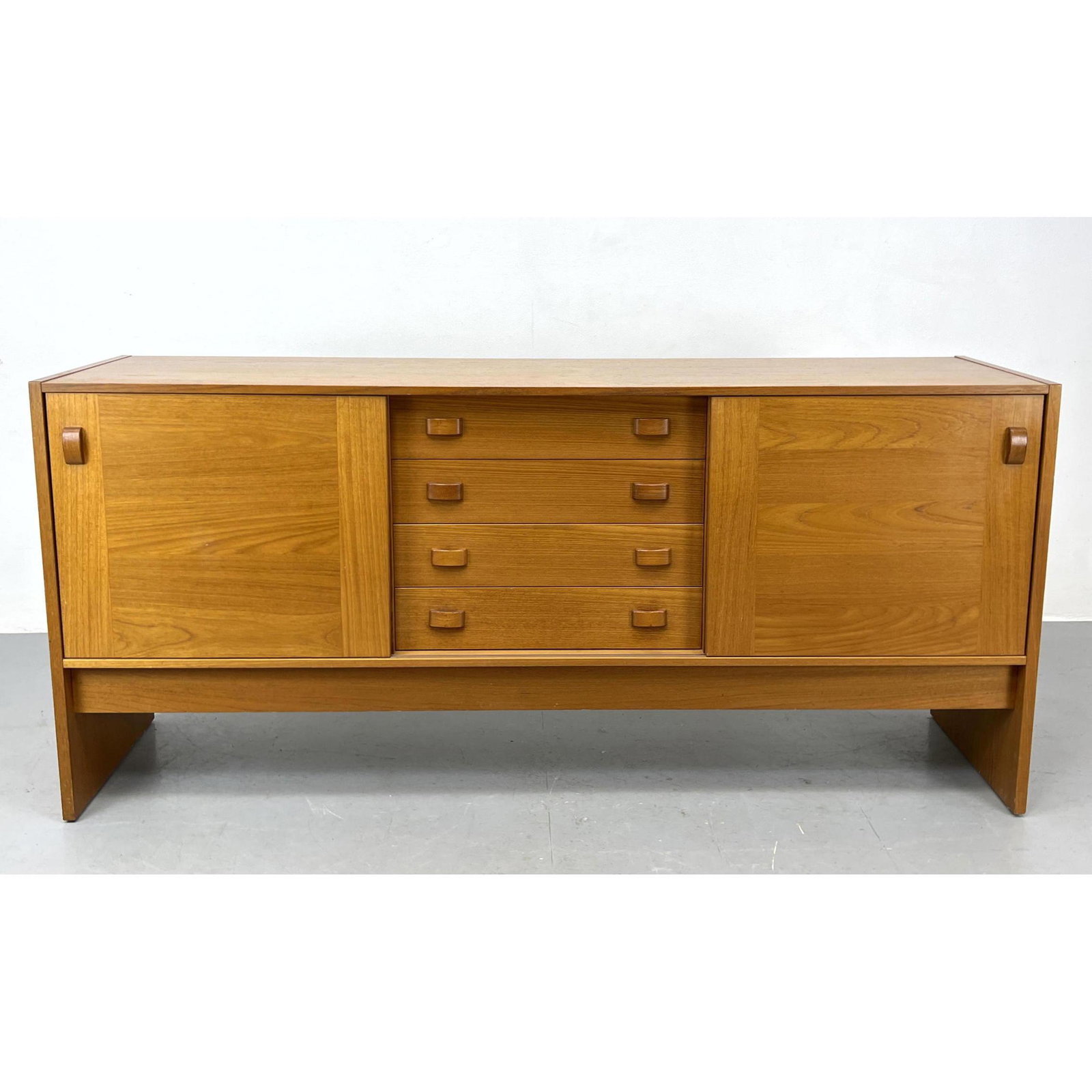 Domino Mobler Denmark teak sliding door credenza sideboard. Danish Modern: Domino Mobler Denmark teak sliding door credenza sideboard. Danish Modern Dimensions: H: 33 inches: W: 72.5 inches: D: 19.5 inches --- We offer curbside delivery to NYC, Manhattan, Close Brooklyn, Hob