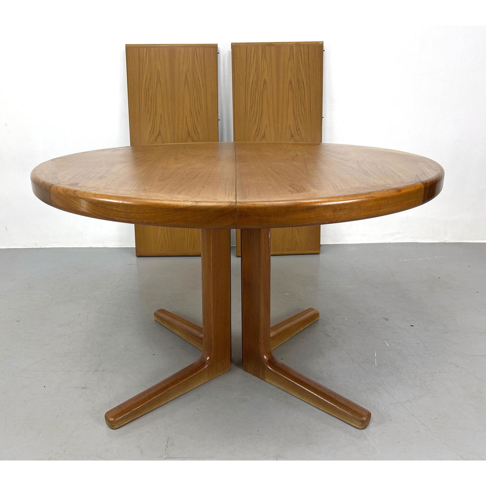 VEJLE STOLE Danish Modern Teak Dining Table. Round Top on pedestal base with four extended feet. Mar (1 of 10)