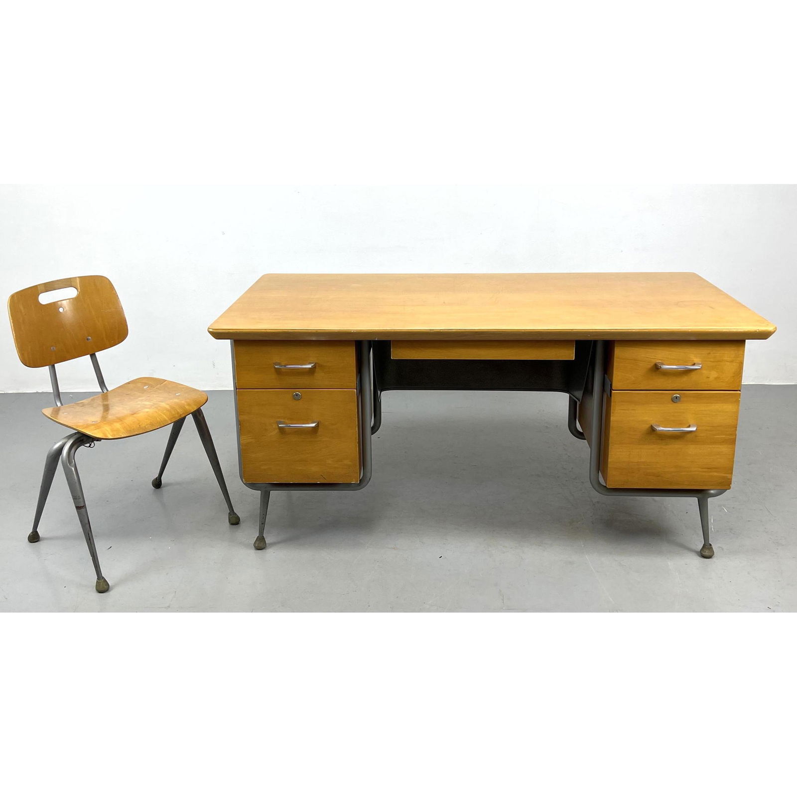Raymond Loewy for Brunswick Executive Desk and Chair. . Maple and Steel.: Raymond Loewy for Brunswick Executive Desk and Chair. . Maple and Steel. Dimensions: H: 29 inches: W: 60 inches: D: 30 inches --- -- We offer curbside delivery to NYC, Manhattan, Close Brooklyn, Hobok