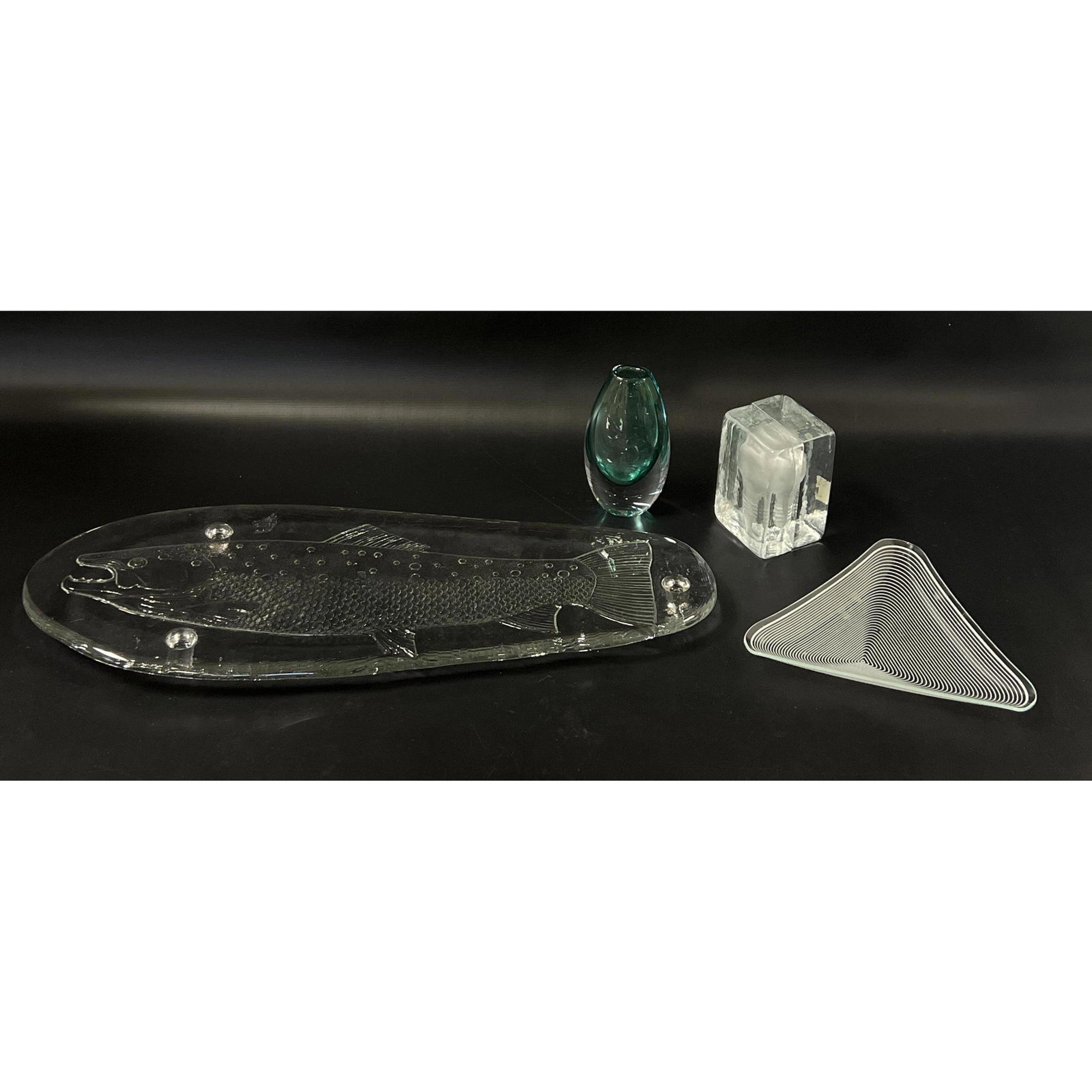 Modernist Glass Lot. Fish Tray, Linnberg Vase, Bookends.: Modernist Glass Lot. Fish Tray, Linnberg Vase, Bookends. Dimensions: H: 1 inches: W: 22 inches: D: 9.5 inches --- US Shipping charge: In house shipping available. Will be calculated once destination k