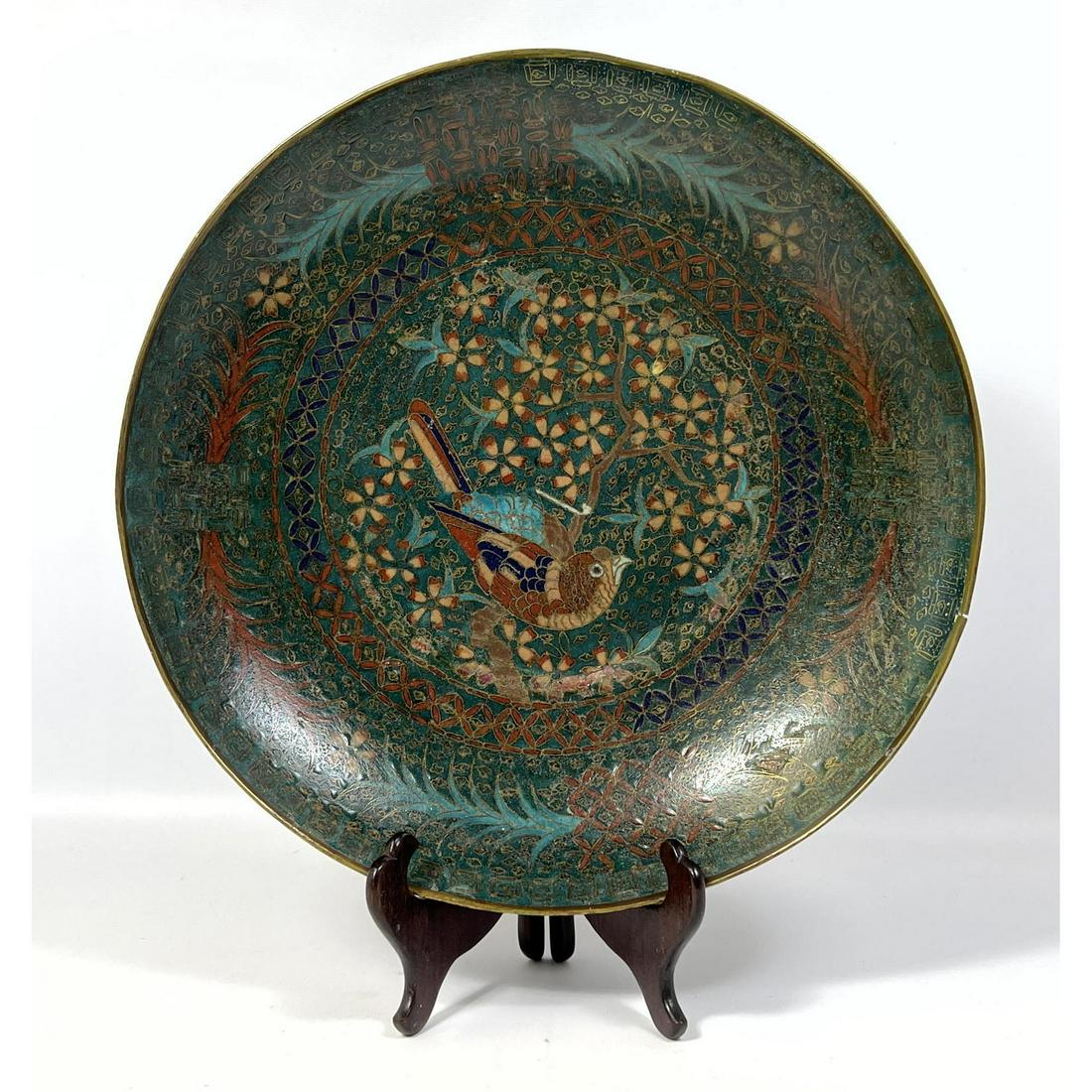 Older Cloisonne charger bird and floral on brass.: Older Cloisonne charger bird and floral on brass. Dimensions: H: 13.5 inches: W: 13.5 inches: D: 2.5 inches --- US Shipping charge: $35 Plus insurance at a rate of $1 per hundred.